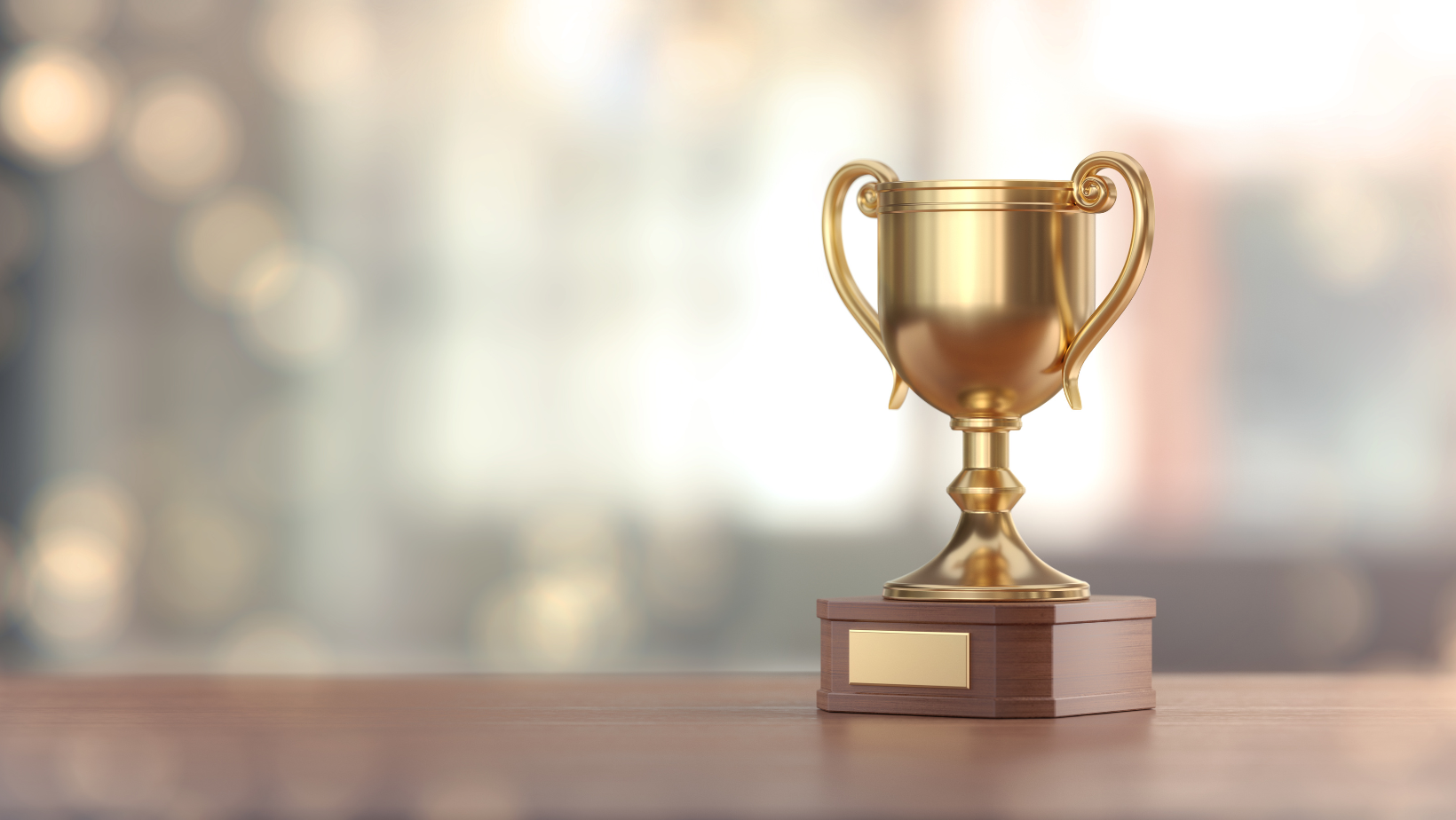 photo of trophy sitting on a desk