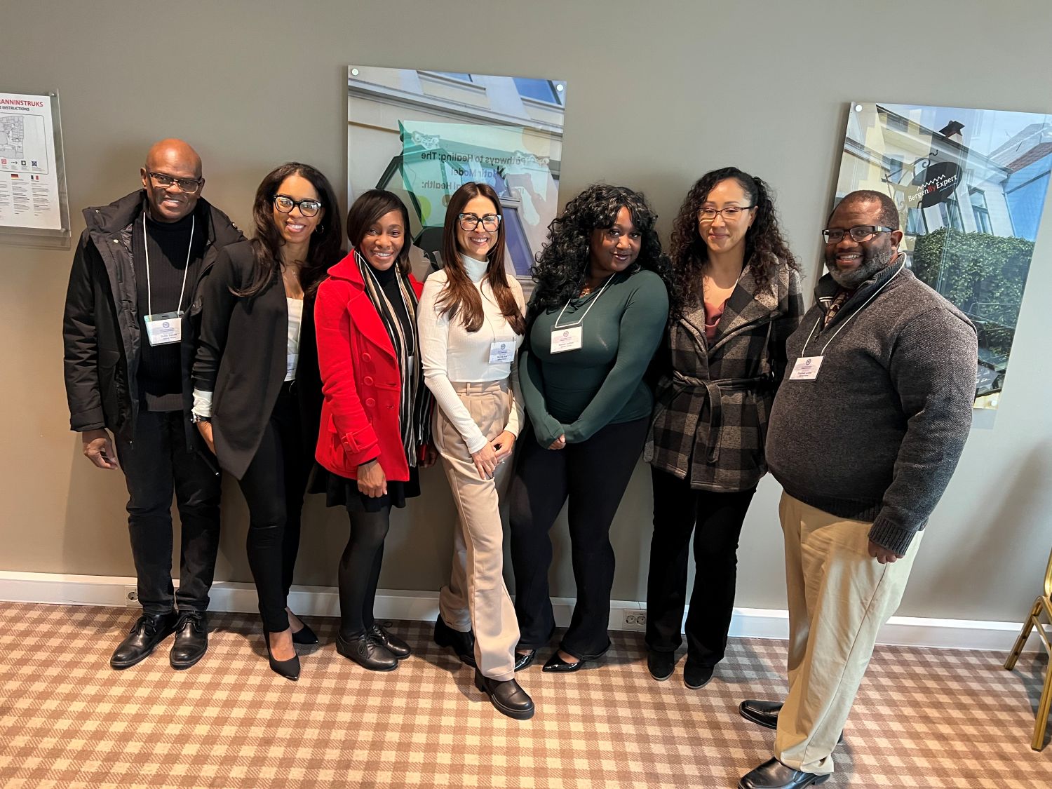 LLU School of Behavioral Health students, alumni, and program director Zephon Lister pose together at the 2026 IFTA World Congress in Bergen, Norway.