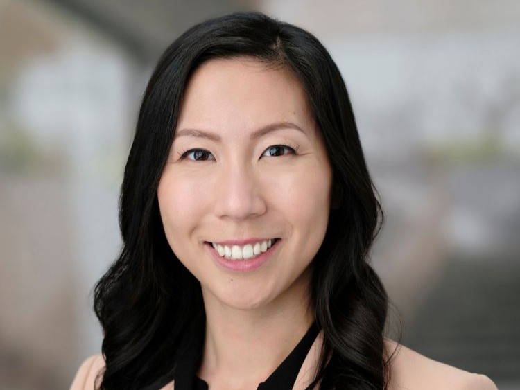 Sharon Lee, Assistant Professor of Psychology, smiling in a professional headshot.