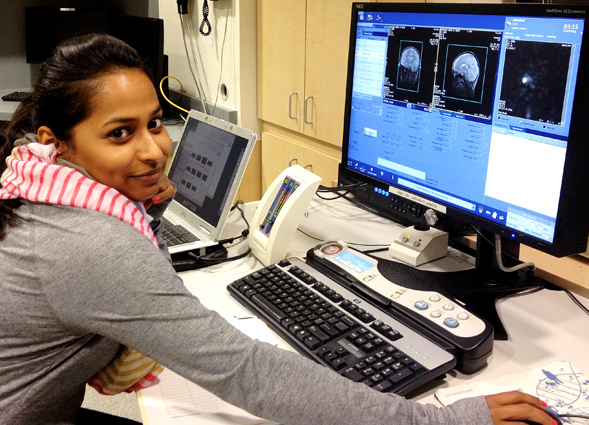 Dr. Aarti Nair working on a research study