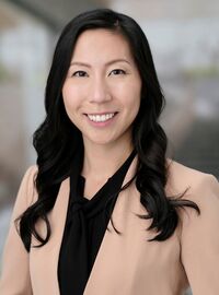 Dr. Sharon Lee, Assistant Professor of Psychology, smiling in a professional headshot.
