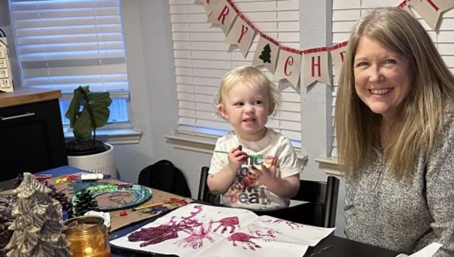 Dr. Kimberly Freeman painting with granddaughter