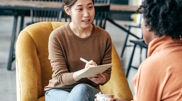 Two women chatting