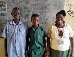 family in Sierra Leone classroom