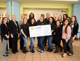 LLUCH receives check from Spirit of Children