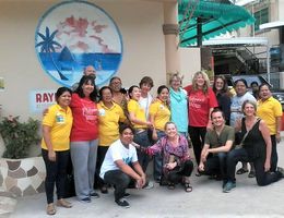 Members of the Trauma Team pose with a group of trainees