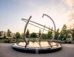 Sunrise at the globe statue on campus