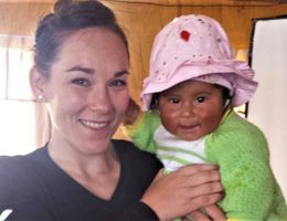 Celia with a child in Peru