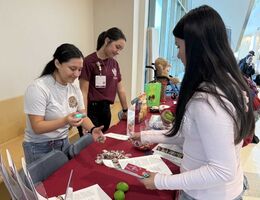 SBH students speak with My Campus participants at an information booth