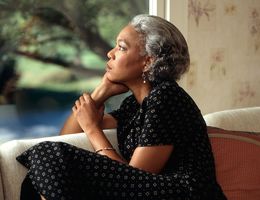 Woman looking out window