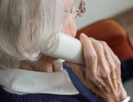 Older woman talking on phone