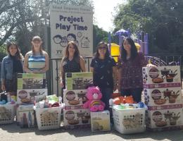 Phi Alpha students deliver laundry gift baskets to Inland Housing Solutions